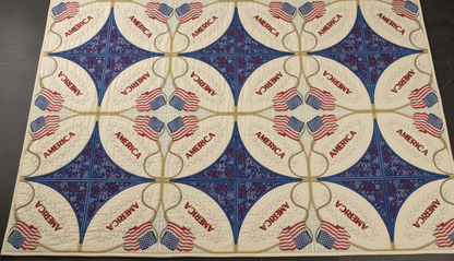 Decorative mat with American flag design and 'America' text on a dark surface